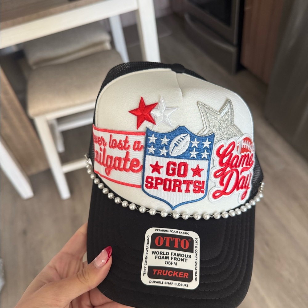Black and White Sports Cap with Red and Silver Accents